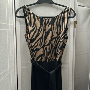 Brand new beautiful print contrast Bebe jumpsuit.